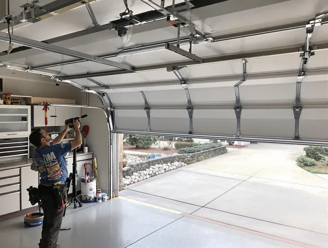 Garage door track repair service by Madison Garage Door Repair in Madison